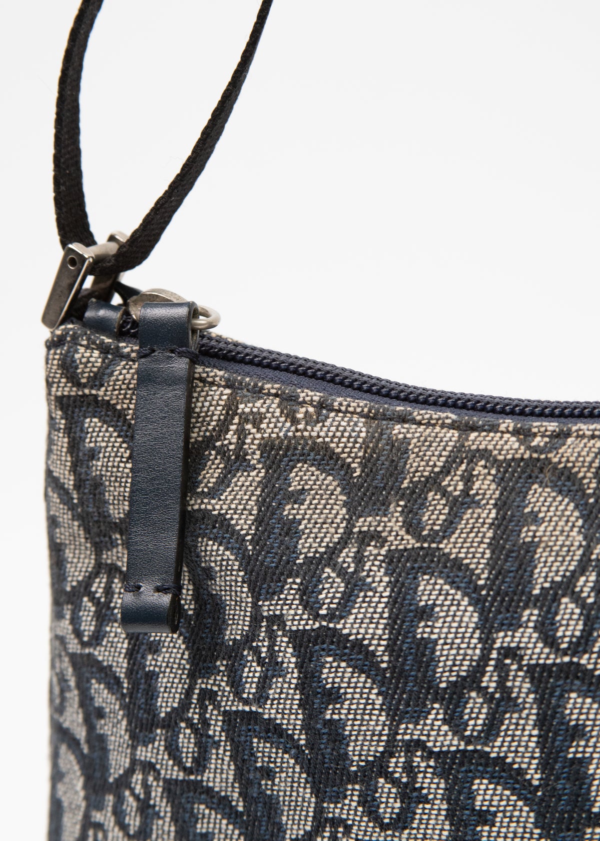 08-dior-small-trotter-zoom-okucia