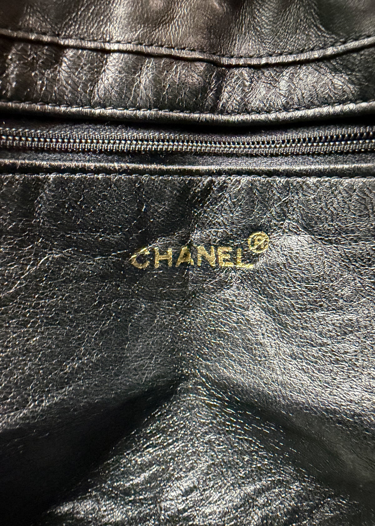 09-chanel-lambskin-quilted-mini-bucket-zoom-logo