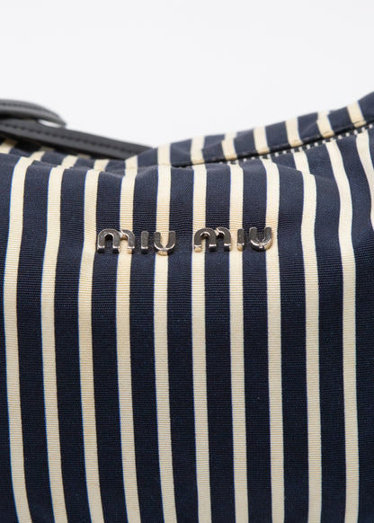 09-miu-miu-spirit-zoom-logo
