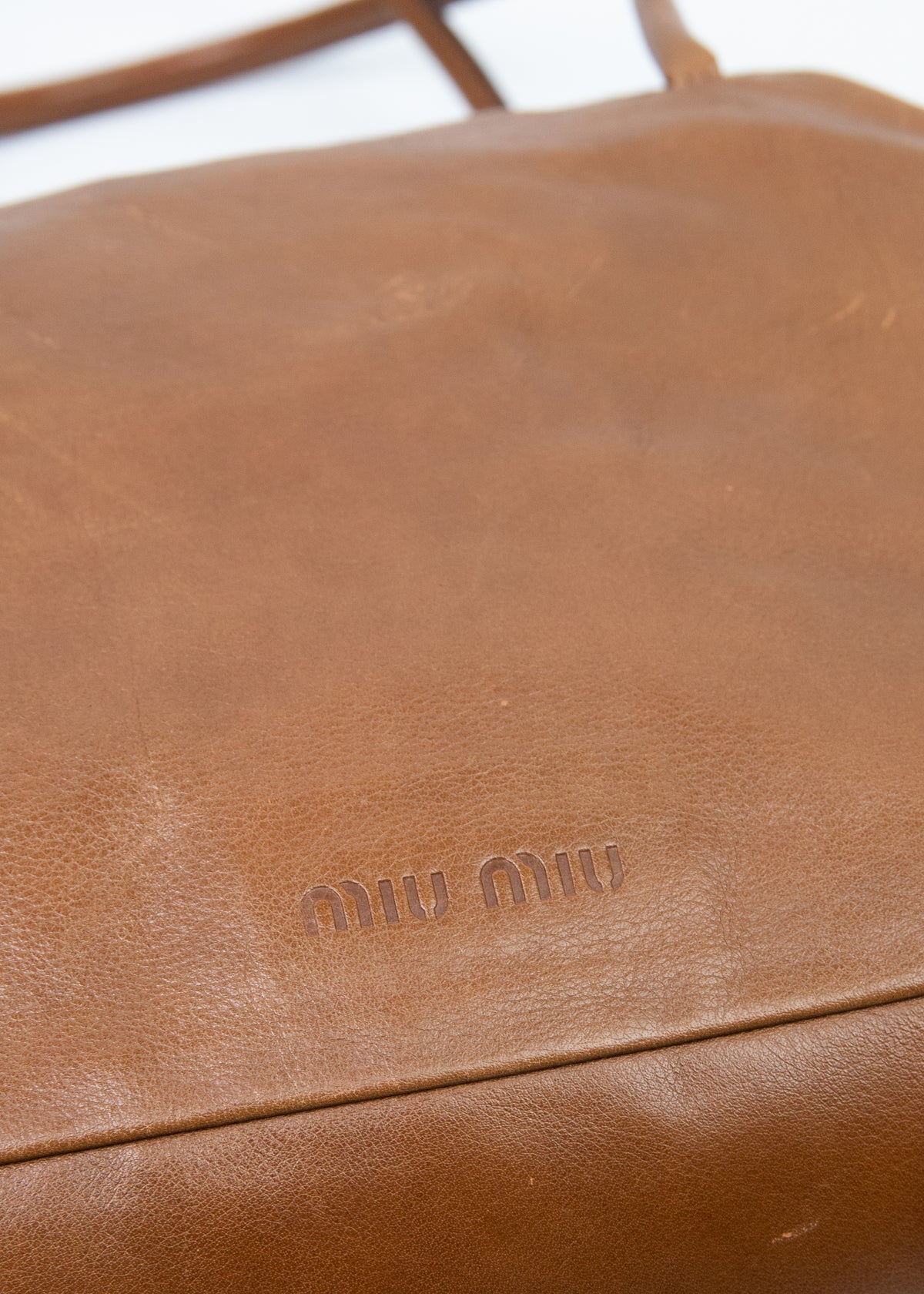 10-miu-miu-lambskin-brown-zoom-logo