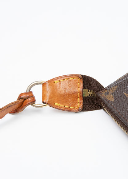 11-louis-vuitton-pochette-zoom-uchwyt